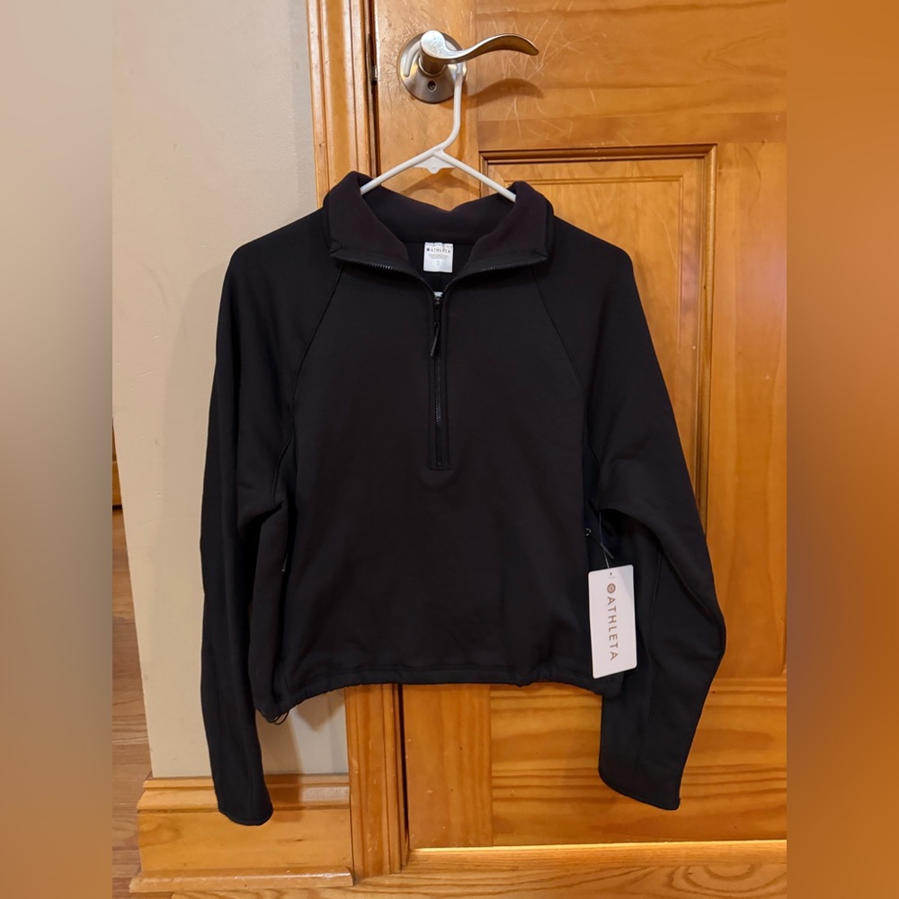 Brand NEW Athleta black ALTITUDE EDGE
1/2 ZIP SWEATSHIRT size XS